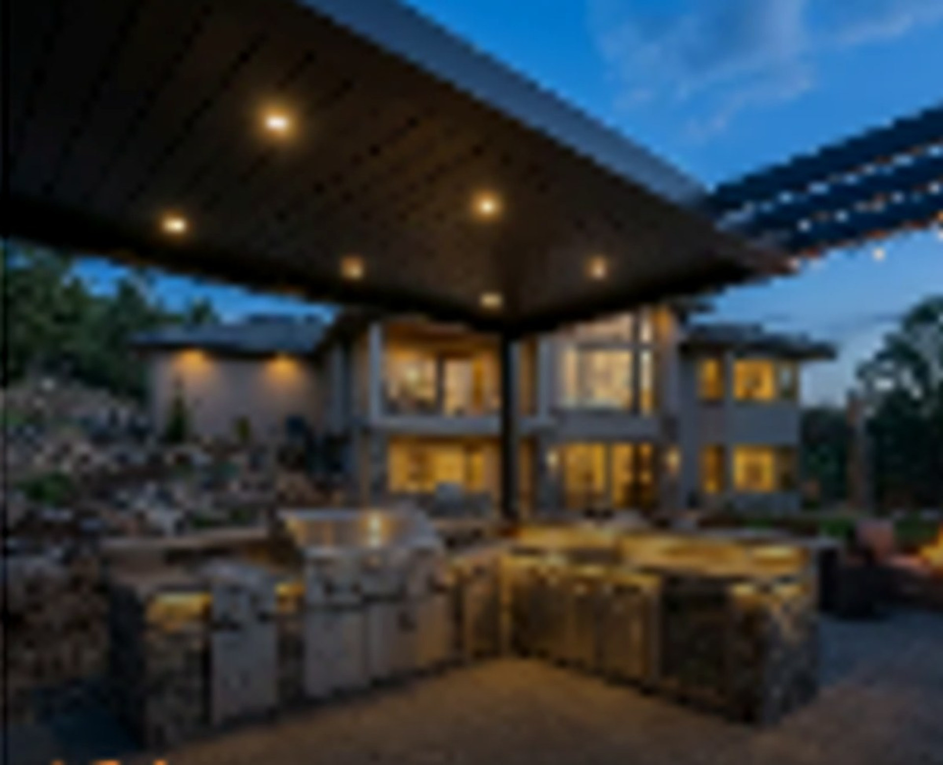 Family and friends outdoors near cooking equipment