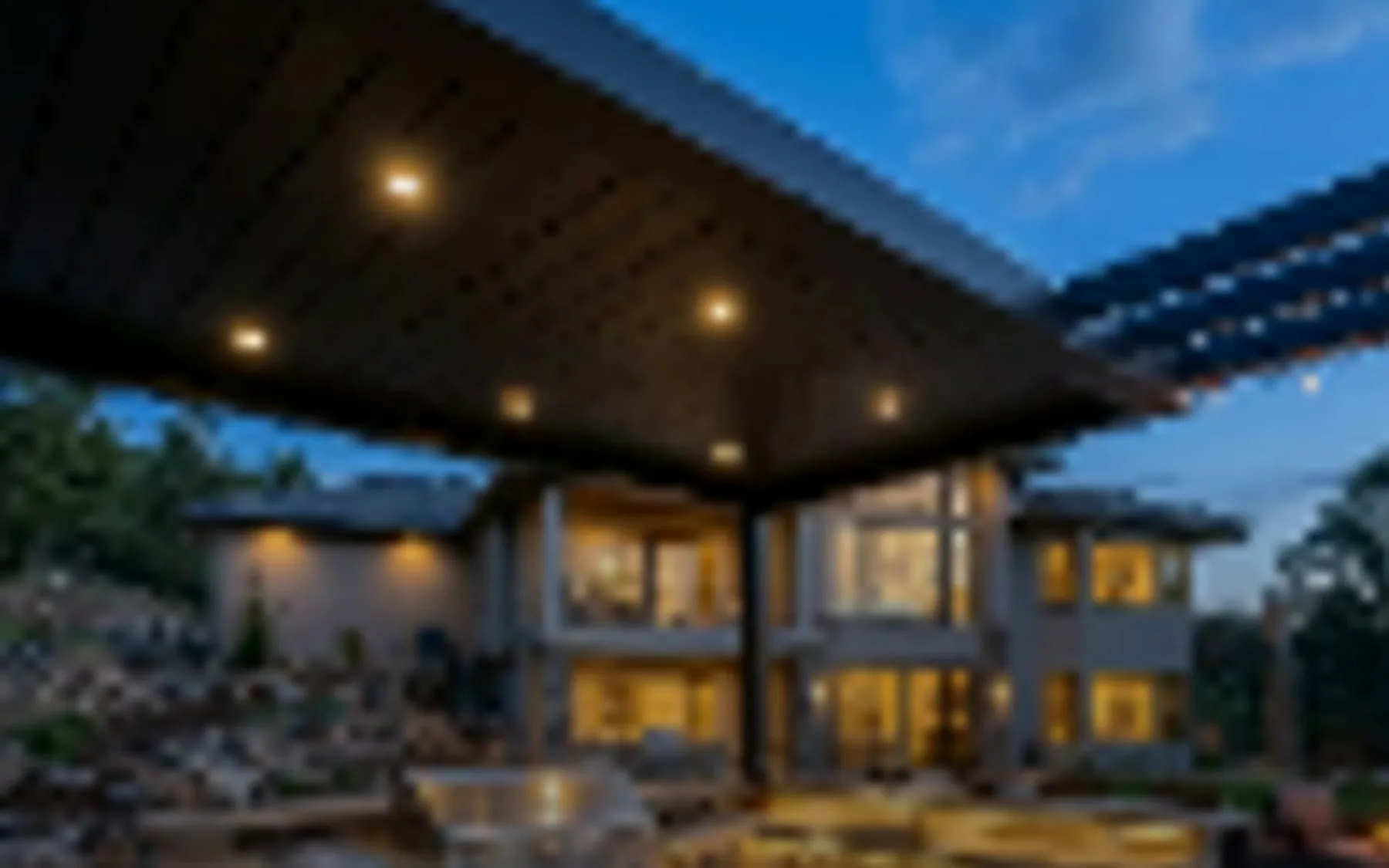Outdoor cooking space with integrated grill
