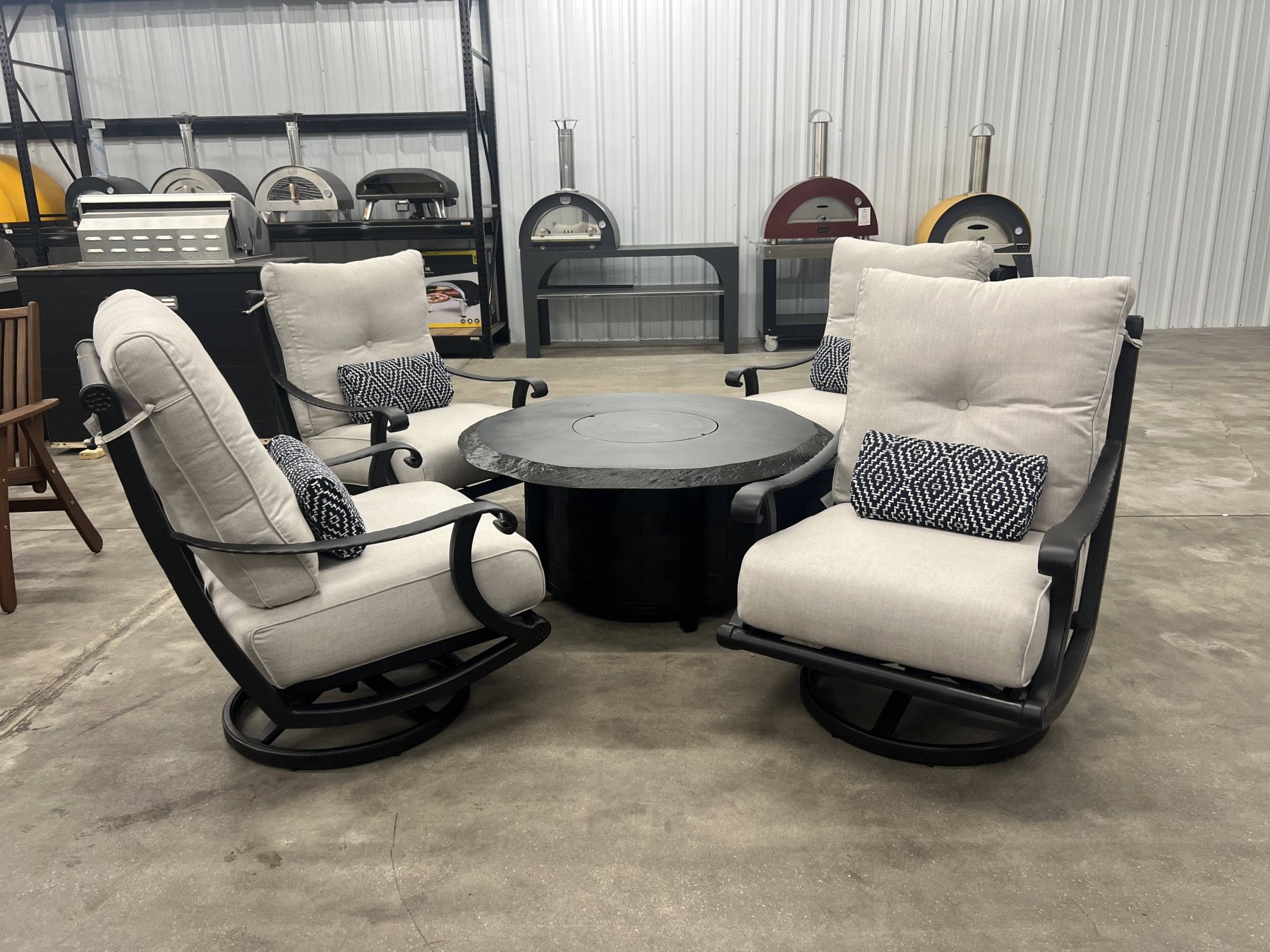 Local Special: Castelle Telluride High Back Swivel Rockers in Antique Dark Rum with Idol Seagull Cushions and Castelle Classical 49" Fire Pit